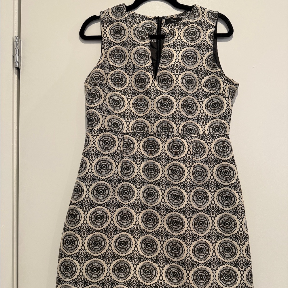 Elegant Black and Cream Patterned Dress